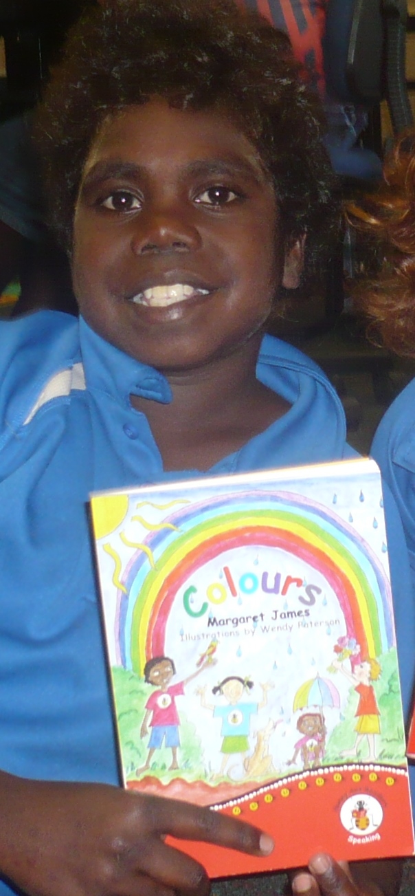 Honey Ant Readers Colours book Indigenous student reading Honey Ant Readers' Colours book.