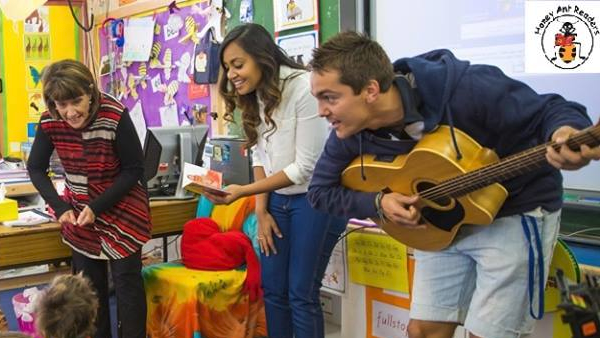 Jessica Mauboy, with Joe and Marg, leading the class singing HAR songs. 
